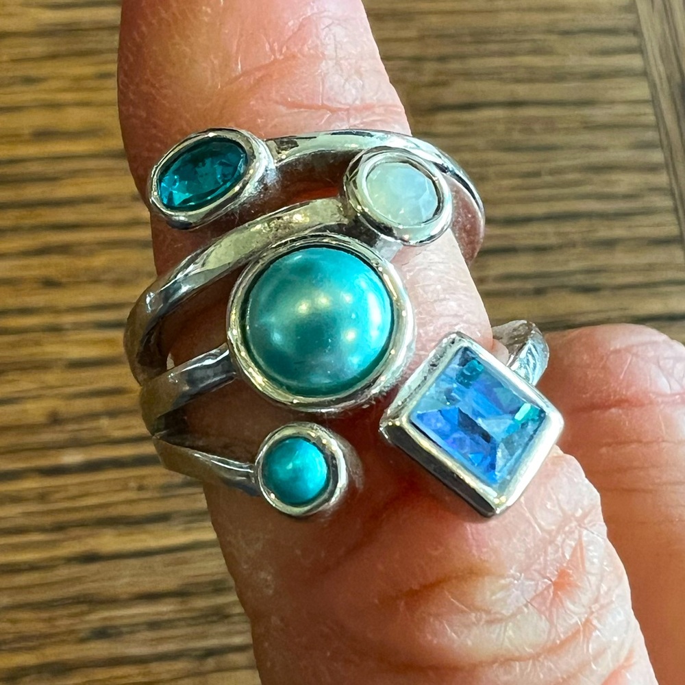 Lia Sophia 5 stone ring  3 stones are teal colored, light blue and opal white